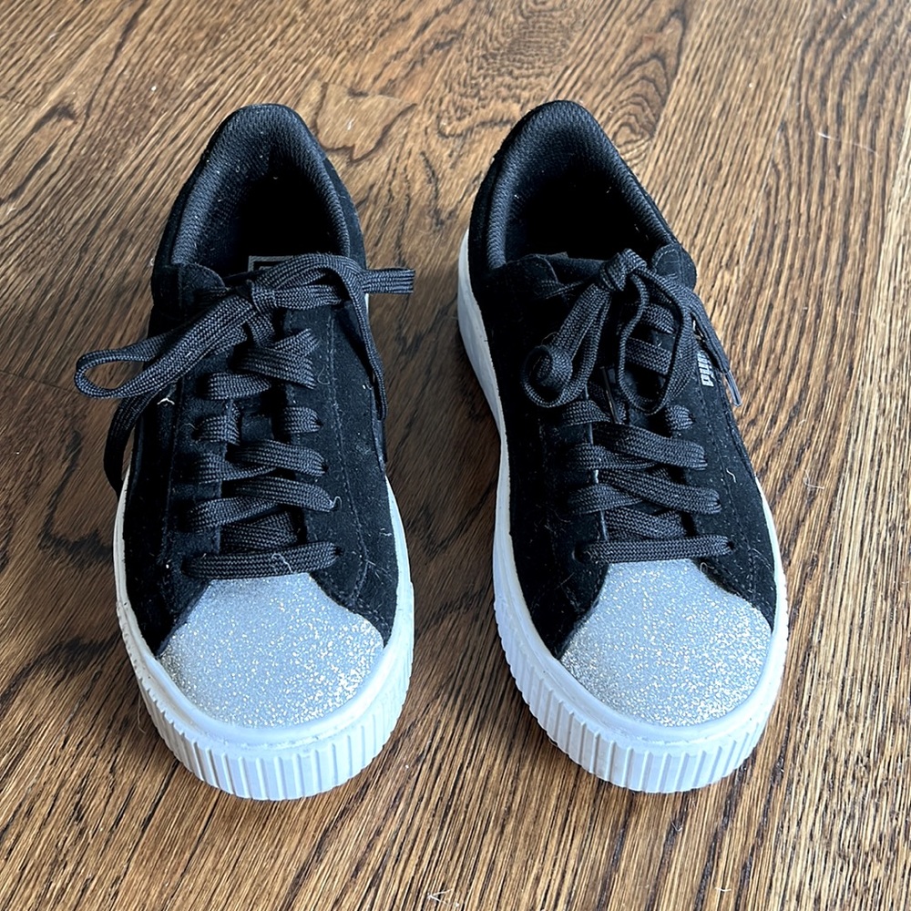 Puma Girls black and silver sneakers size 4. Worn twice. Excellent condition